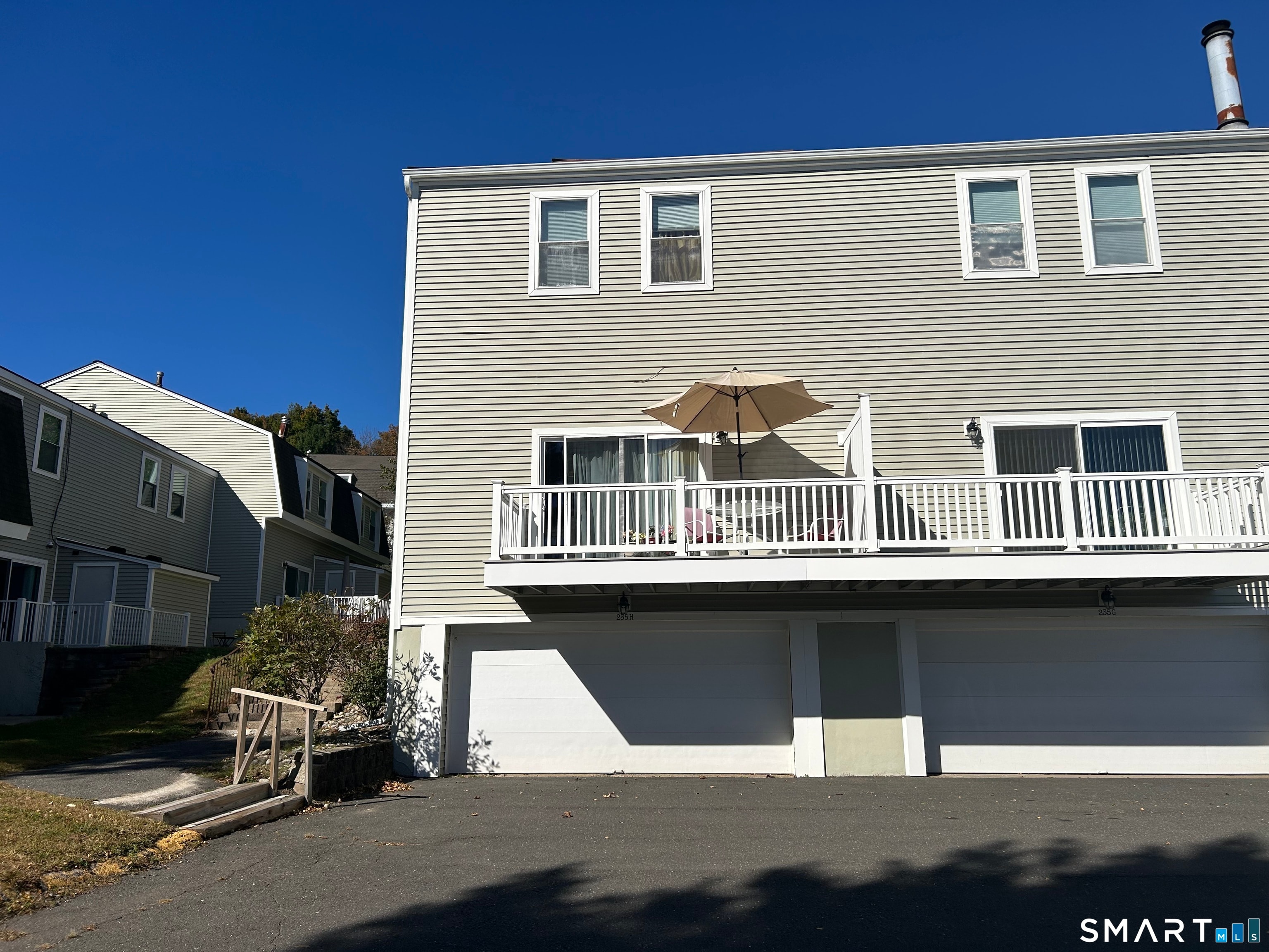235 Brittany Farms Road Unit H, New Britain, CT — townhouse with deck